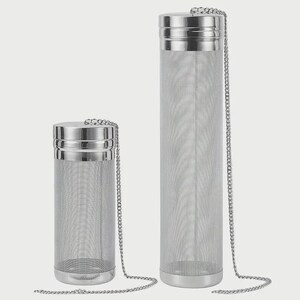 May include: Two stainless steel tea infusers. One is tall and slender, the other is shorter and wider. Both have a mesh body, a lid, and a chain. The infusers are designed for steeping loose leaf tea.