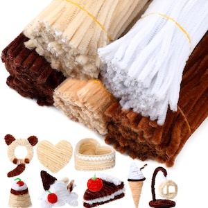 May include: Bundles of brown, tan, and white pipe cleaners are shown, tied with yellow rubber bands. Below are several small, handmade craft items, including a heart, a cake slice, and an ice cream cone, all made from pipe cleaners.