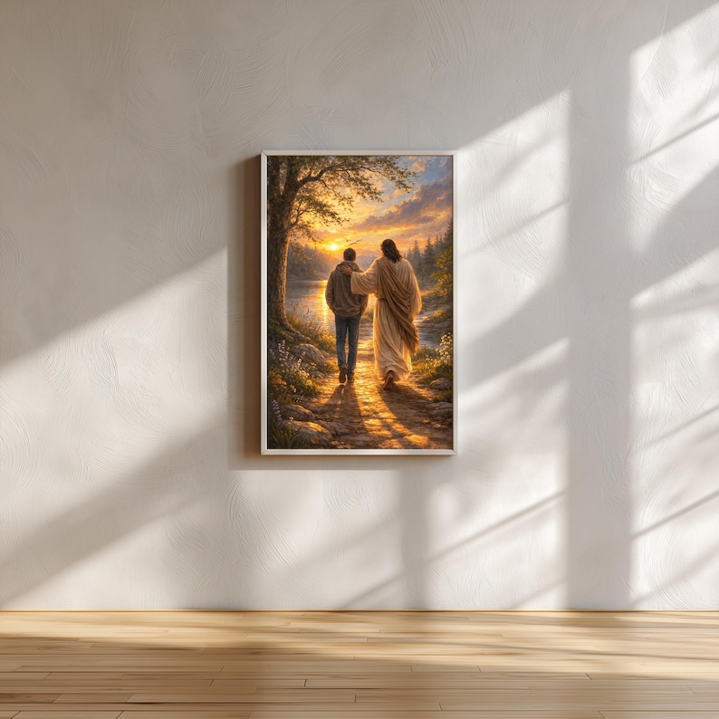 May include: Framed art print depicting a person walking with another figure along a path. The artwork features a warm color palette with a sunset in the background, a tree, and a body of water. The figures are walking towards the light.