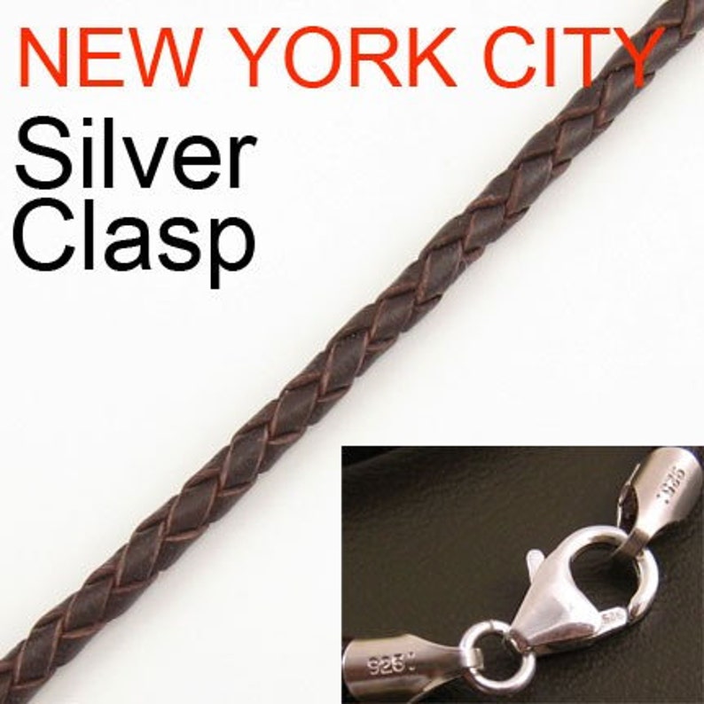 May include: Braided brown leather cord with a silver clasp. The image includes the text "NEW YORK CITY" and "Silver Clasp". The clasp is marked with "925".