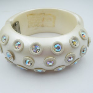 Hinged clamper from the 50s, plastic clamper bracelet with aurora borealis rhinestones