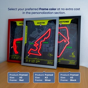 Three framed Austin Formula 1 Circuit of the Americas LED posters displayed side by side on a wooden surface, each featuring a glowing red neon track layout on a dark map background. The frames are shown in red, silver, and black color options, with text indicating A3 size and customizable frame selection. The center poster highlights Austin with track stats and map details, representing modern LED wall art celebrating the United States Grand Prix and Charles Leclerc’s fastest lap.