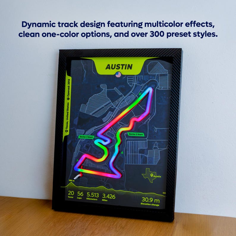 Framed Austin F1 Track Poster featuring a vibrant multicolor LED-style outline of the United States Grand Prix circuit at Circuit of the Americas. The motorsport wall art showcases a rainbow neon track effect, a detailed circuit map background, track statistics, and a carbon-textured black frame. Image highlights customizable color options with over 300 preset styles inspired by Charles Leclerc's Ferrari fastest lap in Austin.