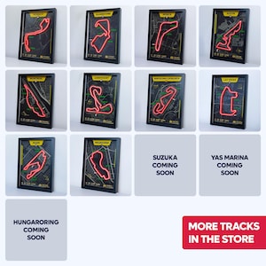 A collage of framed Formula 1 neon racetrack wall art displayed on a wall, featuring glowing red LED-style outlines of famous circuits including Monaco, Silverstone, Monza, Austin, Montreal, Zandvoort, Barcelona-Catalunya, Las Vegas, Miami, and Melbourne. Each poster has a black background with yellow and green track details, creating modern motorsport decor, with “more tracks coming soon” placeholders showing upcoming circuits.