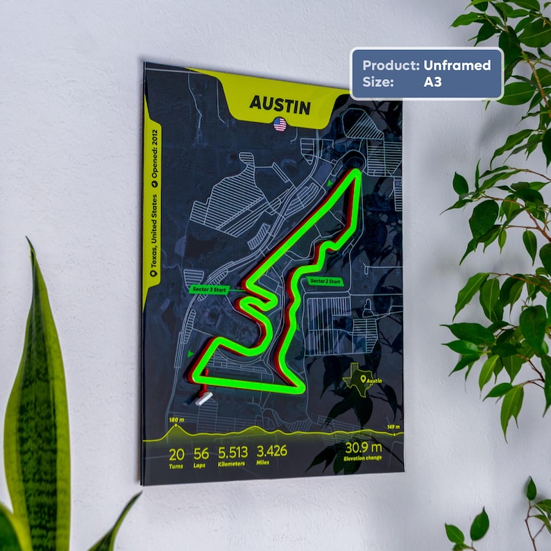 Austin Neon F1 Track Poster featuring the United States Grand Prix circuit in Austin, Texas. The unframed A3 wall art features a dark satellite-style map background with a raised neon-green-and-red LED track layout highlighting Charles Leclerc’s Ferrari fastest lap. Circuit statistics, elevation profile, and location details are printed along the bottom, shown hanging on a modern wall with indoor plants.