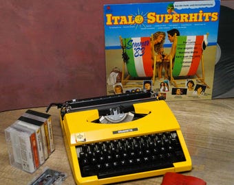 Máquina de escribir Seiko Silverette vintage de 1971, amarilla, en perfecto funcionamiento, japonesa, estilo moderno de mediados de siglo, regalo retro para coleccionistas.