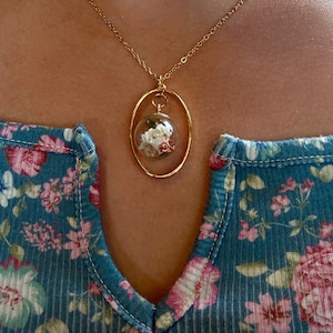 Floral Oval Terrarium Necklace: Gold Globe Pendant with Dried Wildflowers