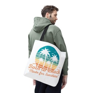 Born to Beach トートバッグ - 太陽の光のために作られた、ビーチバッグ、サマートート、バケーションアクセサリー、環境に優しいショッピングバッグ、ビーチ愛好家へのギフト