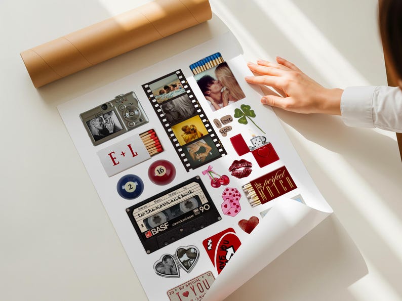 May include: A white poster featuring a collage of various illustrations and photographs, including a digital camera, a film strip, a cassette tape labeled BASF, billiard balls, dice, cherries, a red lighter, and matchboxes with the text E+L and The Perfect Match.