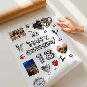 May include: A white sheet with various silver and red birthday-themed stickers, including a 'Happy Birthday' balloon design, the number '18', stars, hearts, and a martini glass. Photos are included in some of the heart-shaped stickers.