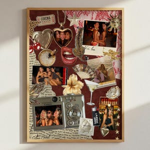 May include: A framed collage featuring photographs, a camera, and various decorative elements. The collage includes a heart-shaped pendant, a lipstick tube, and a lighter with the text "SAINT LAURENT". The background is a mix of printed text and lace.