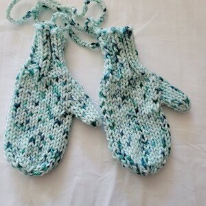 Child&#39;s Mittens On A String