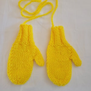 Child&#39;s Mittens On A String