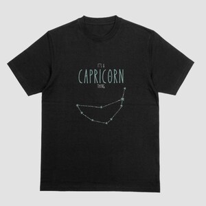 T-shirt Capricorn Zodiac – oversized uniseks zwart T-shirt voor astrologieliefhebbers