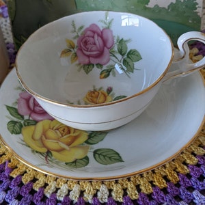 Beautiful Vintage Royal Grafton Cup and Saucer.Pink and Yellow Roses with Gold Accents.