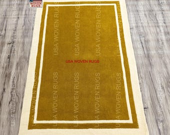 Handgetufteter Wollteppich: Moderne senfgelbe Doppelborte
