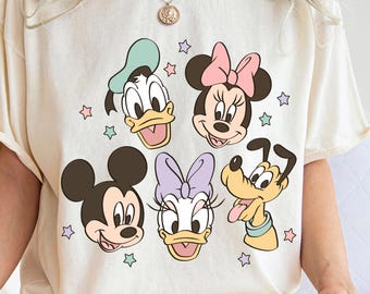 ヴィンテージスタイルのディズニーシャツ、ミッキー、ミニー、ドナルド、デイジー、プルートのレトログラフィックTシャツ、パステルカラーの漫画シャツ、ディズニーファンへのかわいいギフト。