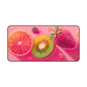 May include: A rectangular mousepad featuring a vibrant illustration of sliced fruit. The design includes a grapefruit, kiwi, and strawberry, set against a pink background with water droplets. The fruit is rendered in a realistic style.