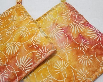 Potholders yellow orange pink batik cotton fabric featuring whimsical floral print, hot pads, trivets, potholders