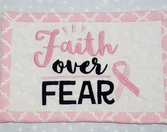 Quilted mug rug with embroidery stitching the breast cancer logo faith over fear,   Pink and white mini quilt, pink breast cancer ribbon