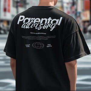 Parental Advisory T Shirt: Christian Streetwear Graphic Tee | God Motive Bold Faith Apparel | Unisex Statement Shirt for Men & Women
