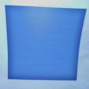 May include: A solid blue square against a white background.