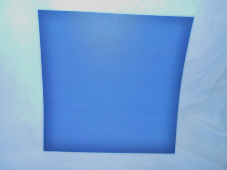 May include: A solid blue square against a white background.