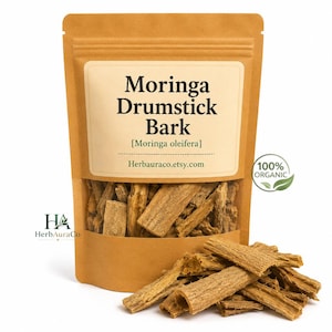 May include: A brown paper bag with a clear window showing Moringa Drumstick Bark. The label reads "Moringa Drumstick Bark [Moringa oleifera]" and "100% ORGANIC". The bark pieces are light brown and textured.