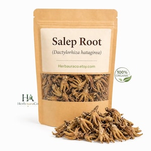 May include: A brown paper bag filled with dried Salep Root (Dactylorhiza hatagirea). The bag has a label with the text "Salep Root" and "Herbauraco.etsy.com". A pile of the dried root is in front of the bag. The label also has a "100% Organic" seal.