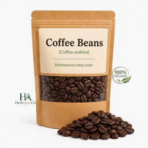 Peut inclure: Un sachet en papier kraft brun contenant des grains de café torréfiés, avec une fenêtre transparente montrant le contenu. L'étiquette indique Coffee Beans, [Coffea arabica] et herbauraco.etsy.com, avec un sceau 100% ORGANIC et des grains.