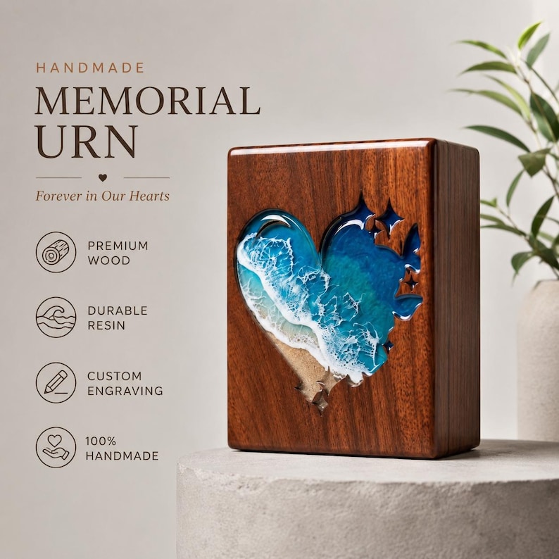 May include: A handmade memorial urn made of premium wood. The wooden box features a heart-shaped resin design depicting a beach scene with blue ocean waves and white foam. The text "Forever in Our Hearts" is visible.