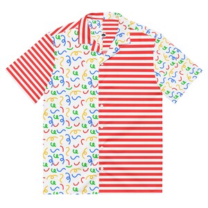 May include: A short-sleeved button-down shirt with a vibrant, eye-catching design. The shirt features a mix of patterns, including red and white stripes, and a white background with colorful squiggles. The shirt is a fun and playful addition to any wardrobe.