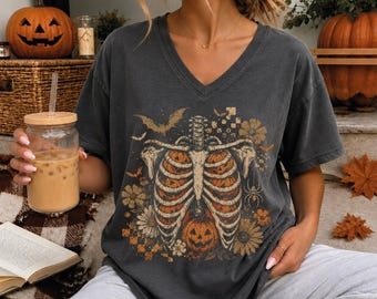 Boho Floral Skeleton Vneck, Gothic Pumpkin Ribcage V-Neck Tee, Spooky Season Tshirt, Trendy Halloween Gift, S1624