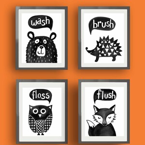 May include: Four black and white illustrations in frames with animal characters and words related to bathroom routines. The top left frame shows a bear with the word "wash" above it. The top right frame shows a hedgehog with the word "brush" above it. The bottom left frame shows an owl with the word "floss" above it. The bottom right frame shows a fox with the word "flush" above it.