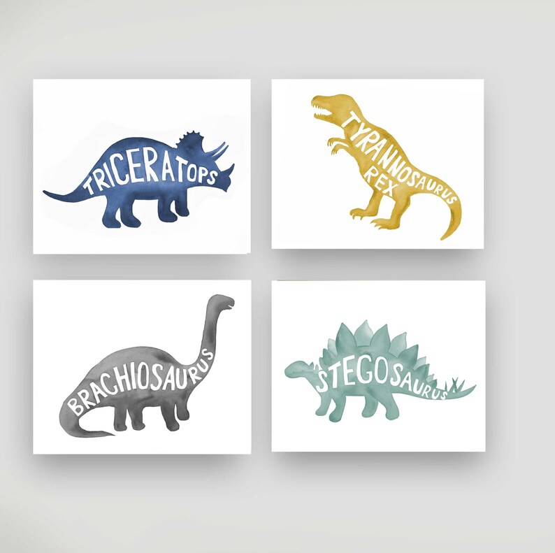 May include: Set of four watercolor dinosaur prints with the names of each dinosaur spelled out within the silhouette. The dinosaurs are a blue Triceratops, a yellow Tyrannosaurus Rex, a gray Brachiosaurus, and a green Stegosaurus.