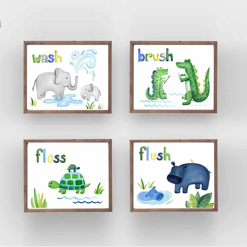 Each print features a different animal and the word 'wash', 'brush', 'floss', or 'flush' in colorful letters. The print with the word 'wash' features a gray elephant and a baby elephant. The print with the word 'brush' features a green alligator brushing its teeth. The print with the word 'floss' features a green turtle with a smaller turtle on its back. The print with the word 'flush' features a blue hippopotamus.