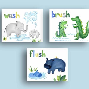 May include: Three watercolor illustrations with animal characters and text. The first illustration shows two elephants, one large and one small, with the word "wash" above them. The second illustration shows two crocodiles, one large and one small, with the word "brush" above them. The third illustration shows a hippopotamus with the word "flush" above it.