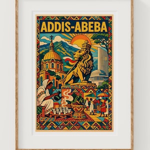 Peut inclure: Une affiche encadrée avec le texte "ADDIS-ABEBA" au-dessus d'une illustration colorée. L'œuvre représente un lion, une église et des personnes en vêtements traditionnels. L'affiche est dans un cadre en bois.