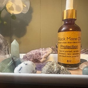 Black Moon Charged Protection or Abundance Oil