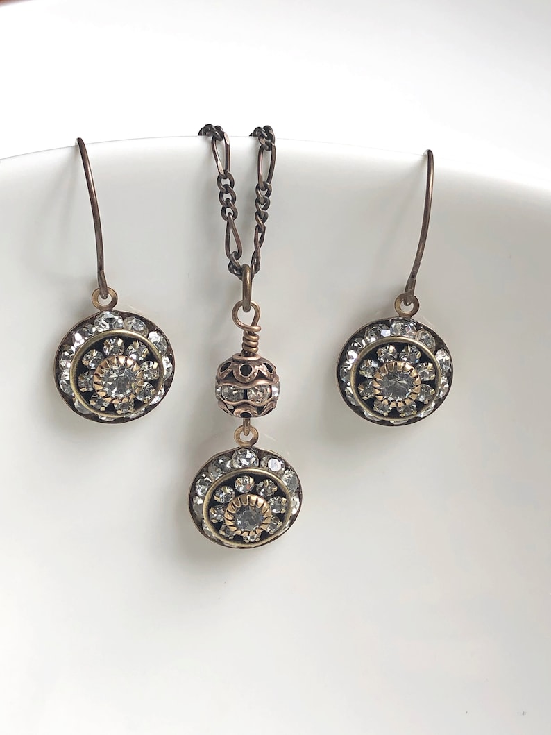 Antique brass art deco jewelry set with crystals for wedding featuring Swarovski crystal art deco earrings and Swarovski crystal art deco pendant necklace