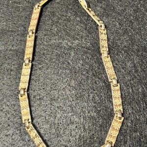 Vintage Sperry goudkleurige ketting met geëtste bloemen