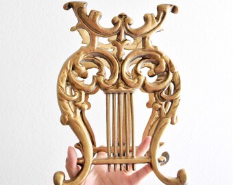 mid century hollywood regency metal gold harp magazine holder / file rack