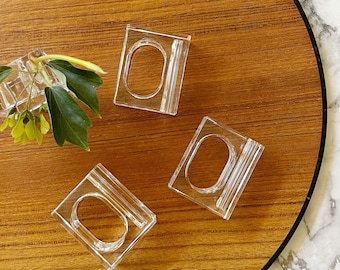 Conjunto vintage modernista dos anos 90 com 4 porta-guardanapos em acrílico transparente | mini vasos