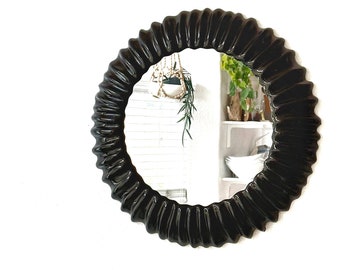 black modernist circle wall mirror