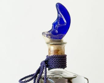 vintage blue cobalt man on the moon glass bottle with cork / half moon figurine vase