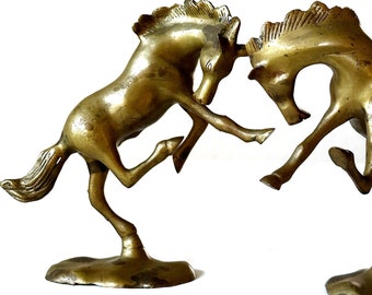 vintage solid brass rodeo horse bookends / hollywood regency / stallion / pony sculpture figurine