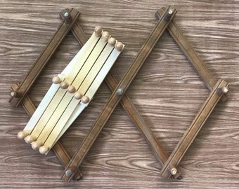 large brown wood accordion wood peg wall hanging rack // hat display storage // organizer