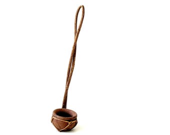 vintage handmade traditional ceremonial ladle or dipper