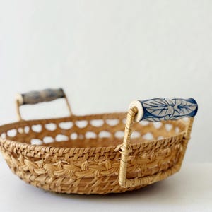 woven wicker basket with delft blue porcelain handles - sweet bread basket