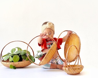 set of 4 asian nesting woven rattan baskets with handles | stacking storage baskets